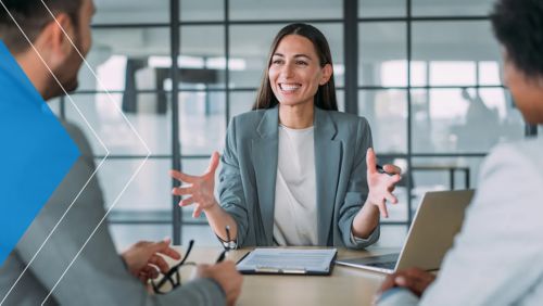 Financial banker meets with business clients as part of her consultative partnership role.