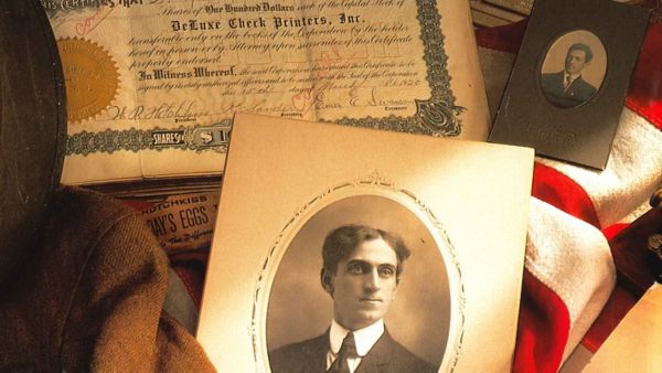 A picture of W.R. Hotchkiss and an original Deluxe document