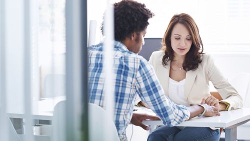 Two people in a meeting