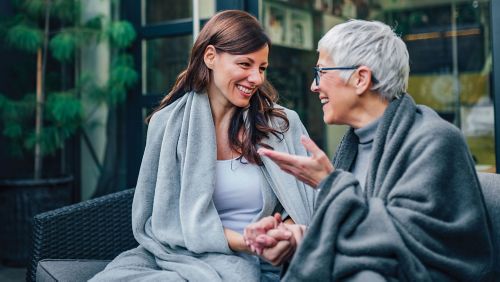 two women discussing life event trigger marketing