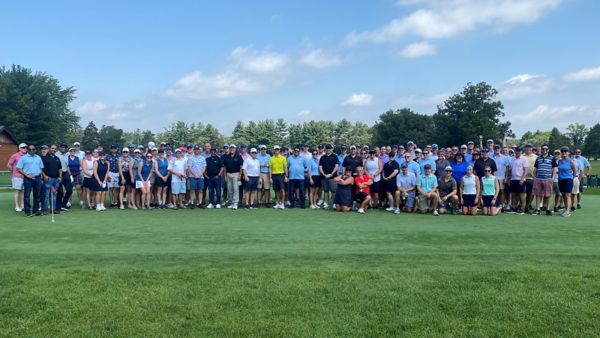Participants of the Deluxe Golf Classic