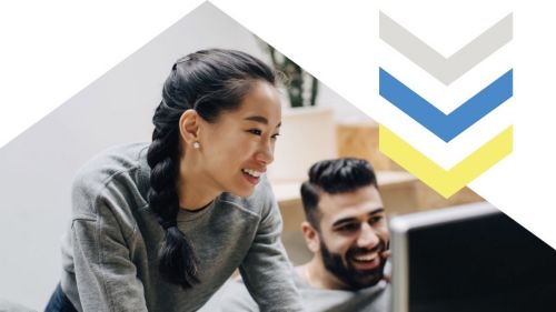 image of woman and man smiling at a computer screen, deluxe chevrons on the right