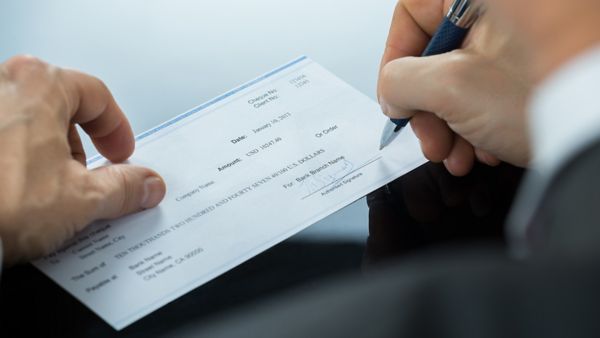 Man writing a check
