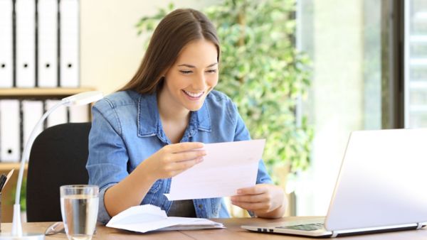 Woman looking at print material