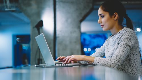 image of girl working on laptop