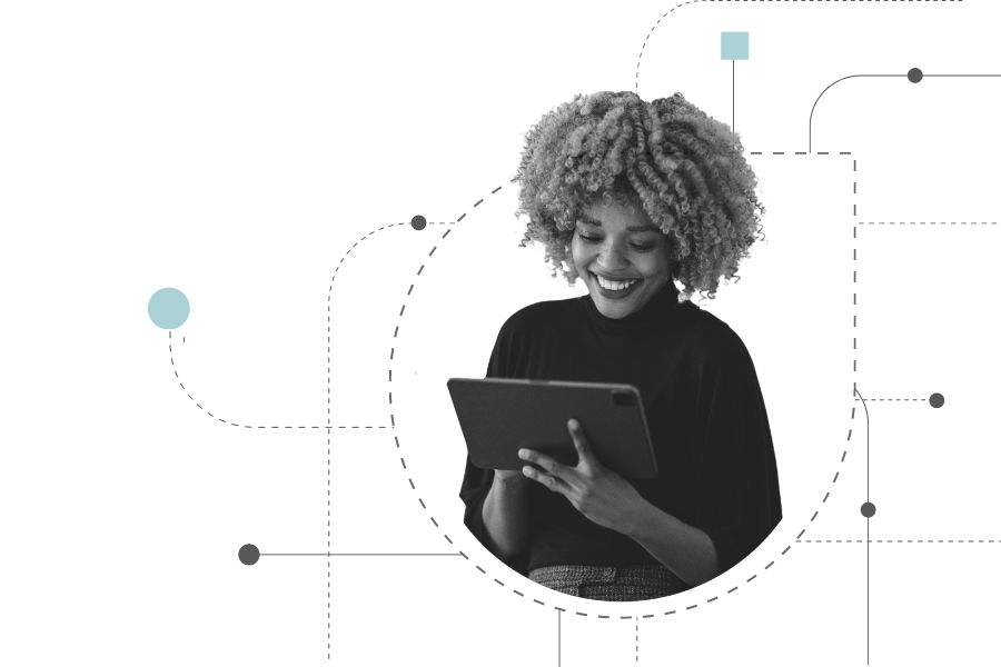 an image of a woman holding a tablet representing omnichannel payment platform to manage payment methods.