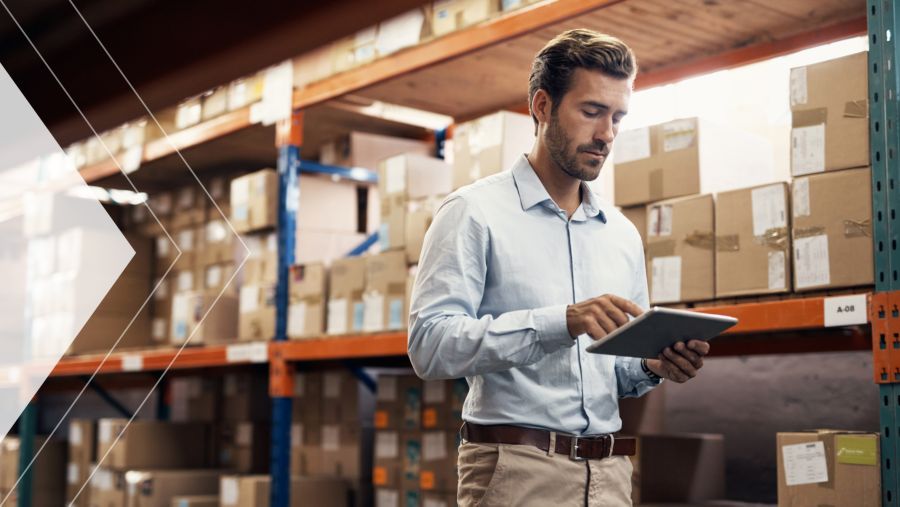 A close up of a person writing on paperwork