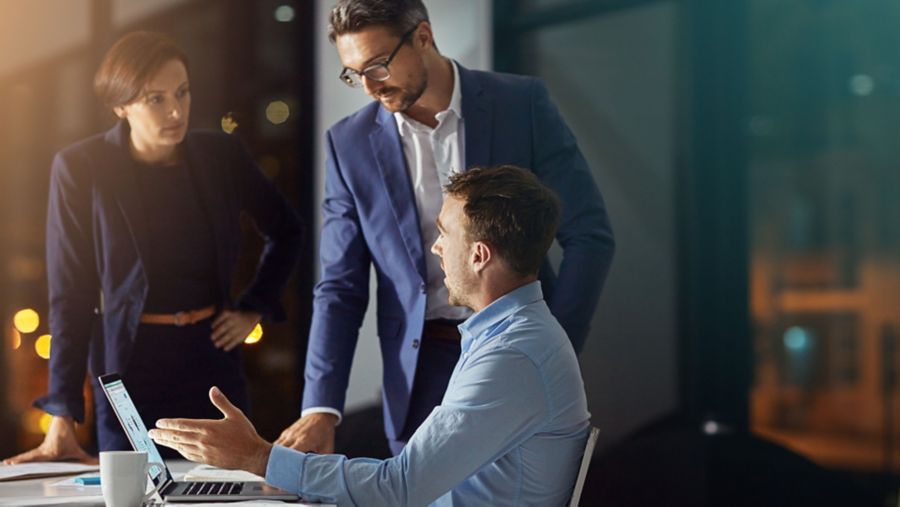 three people discussing accounts receivables
