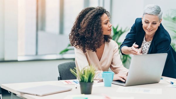 women looking at computer