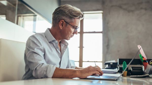 man working on laptop