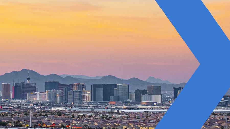 Skyline of Las Vegas (site of Financial Brand Forum 2022) in distance with desert mountains in background