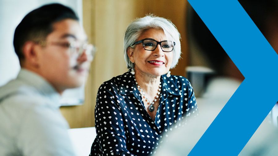 Smiling woman in business meeting