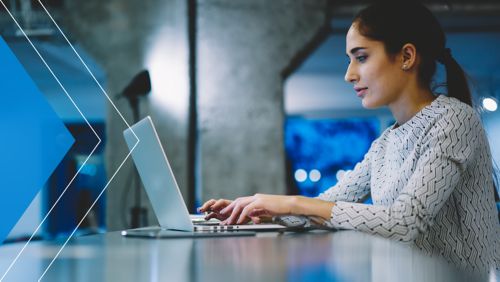 Woman using AI on a laptop