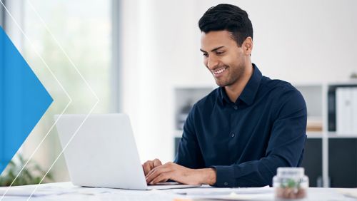 A businessman working on his laptop.