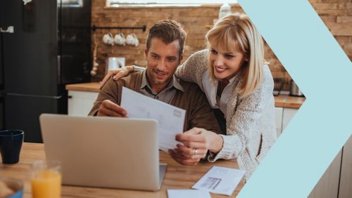 couple looking at bill