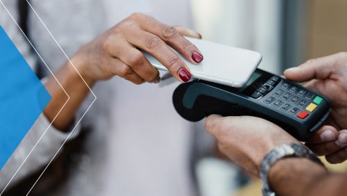 Woman using her phone to pay