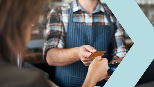 woman paying with card