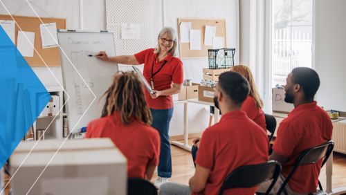 Mature woman  leading a meeting of volunteers