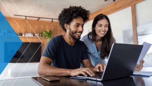 Young couple shopping online for financial services.