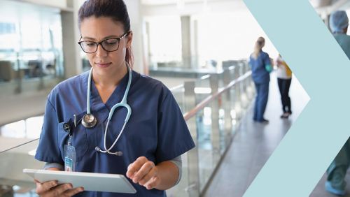 healthcare professional looking at tablet