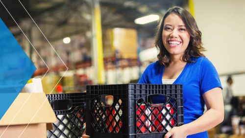 Woman smiling holding nonprofit donations