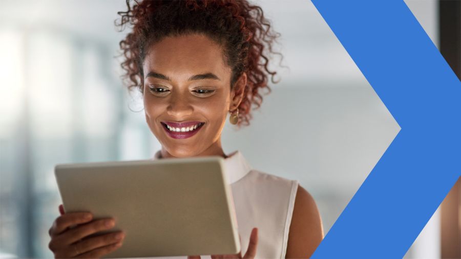 A potential customer reads a relevant credit offer she received via email. Email is a great way to make a firm offer of credit.