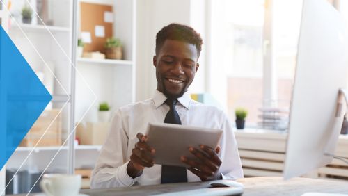 Man reviewing end-of-day sales on a digital tablet.