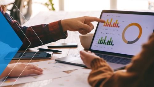 Financial marketers working on a direct mail marketing campaign.