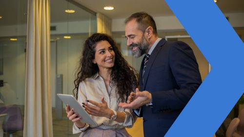 Two banking professionals meeting in office