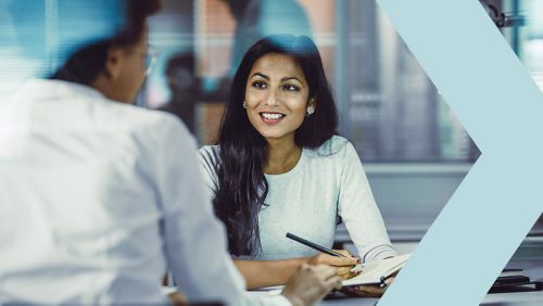 Two businesspeople working in office 