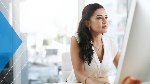 Businessperson working at her desk.