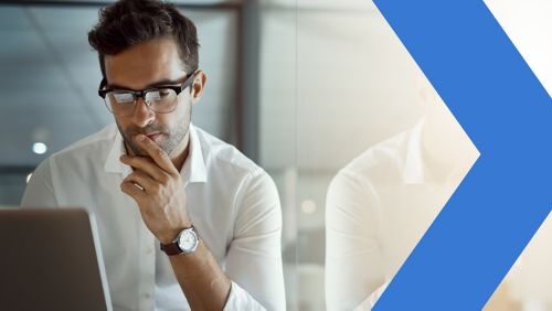 Business owners shaking hands with a banker