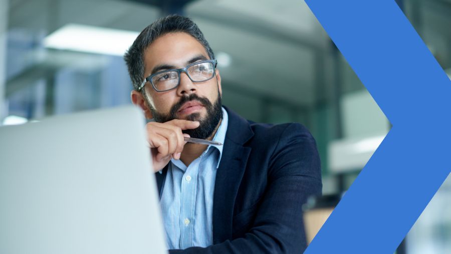 Business person considering best strategies for moving forward in a challenging moment