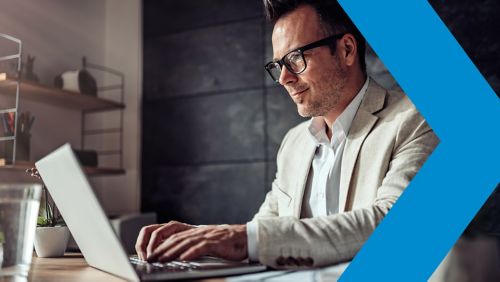 Man working on laptop in office 