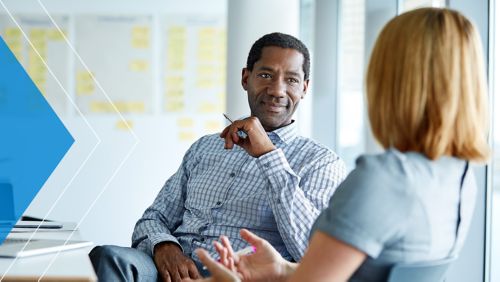Two bankers having a conversation.