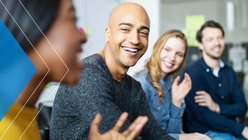 Group of people engaging in an excited discussion. 