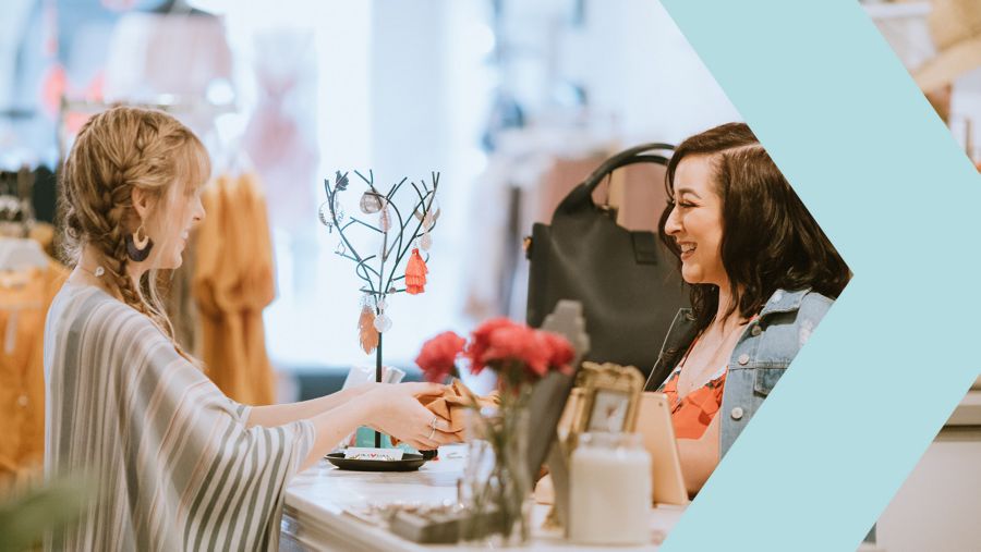 boutique owner with customer