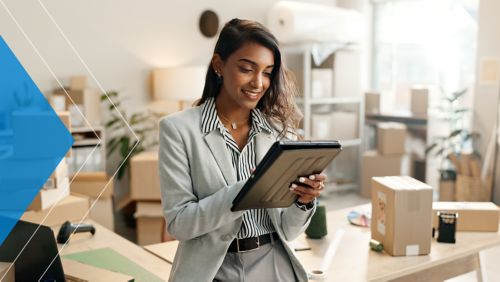 Entrepreneur using digital technology to run her business.