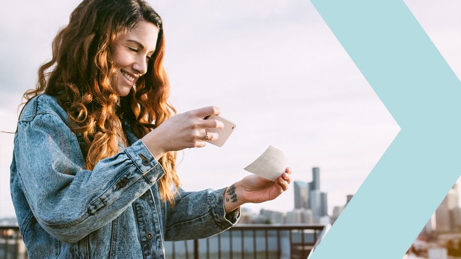 woman depositing stimulus check