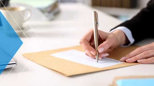 Businesswoman writing a check