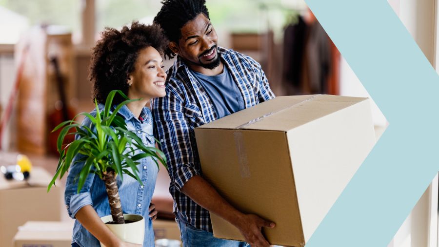 Young couple moving into a new home