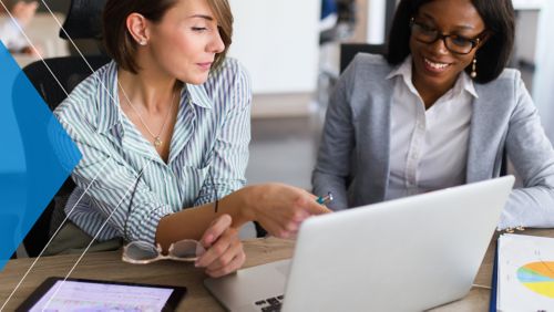 Two marketers working on a campaign together.