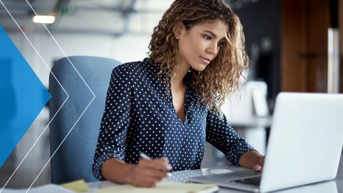 Young businesswoman managing a digital payment on her laptop