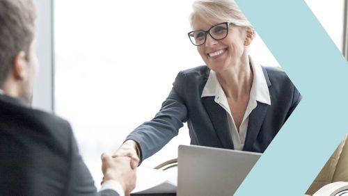 Two colleagues shaking hands