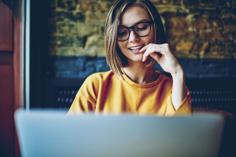 woman looking at computer screen