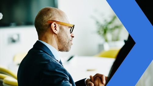 Mature business person listening in an important meeting