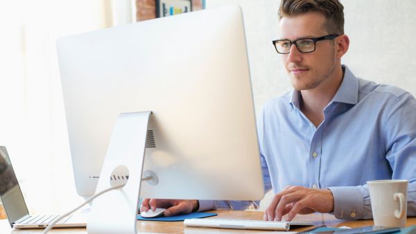 man using laptop