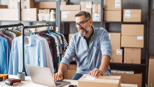 business owner using online payment page for website