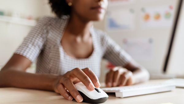 woman using a computer mouse