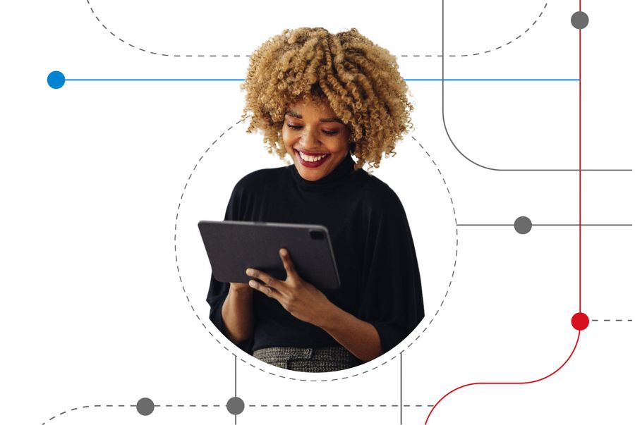 A woman holds a tablet with omnichannel solutions
